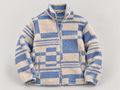 AI-edited studio view of blue & cream geometric sherpa jacket