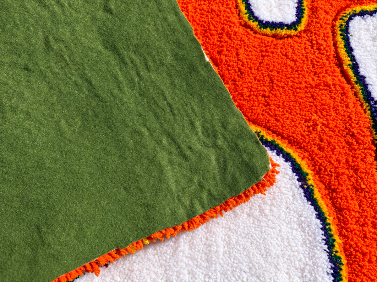 AI-edited green felt backing detail
